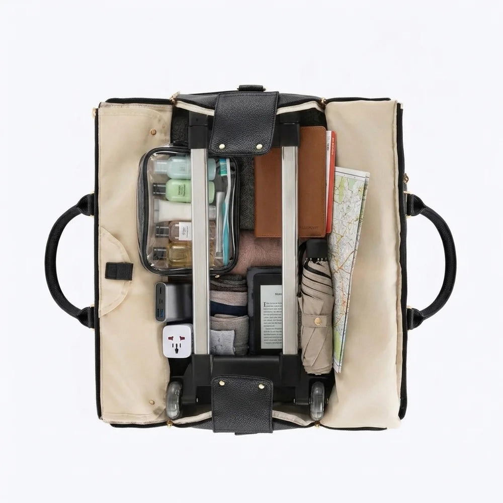 The Luhxe bag opened flat, packed with clothes, toiletries and shoes in separate compartments